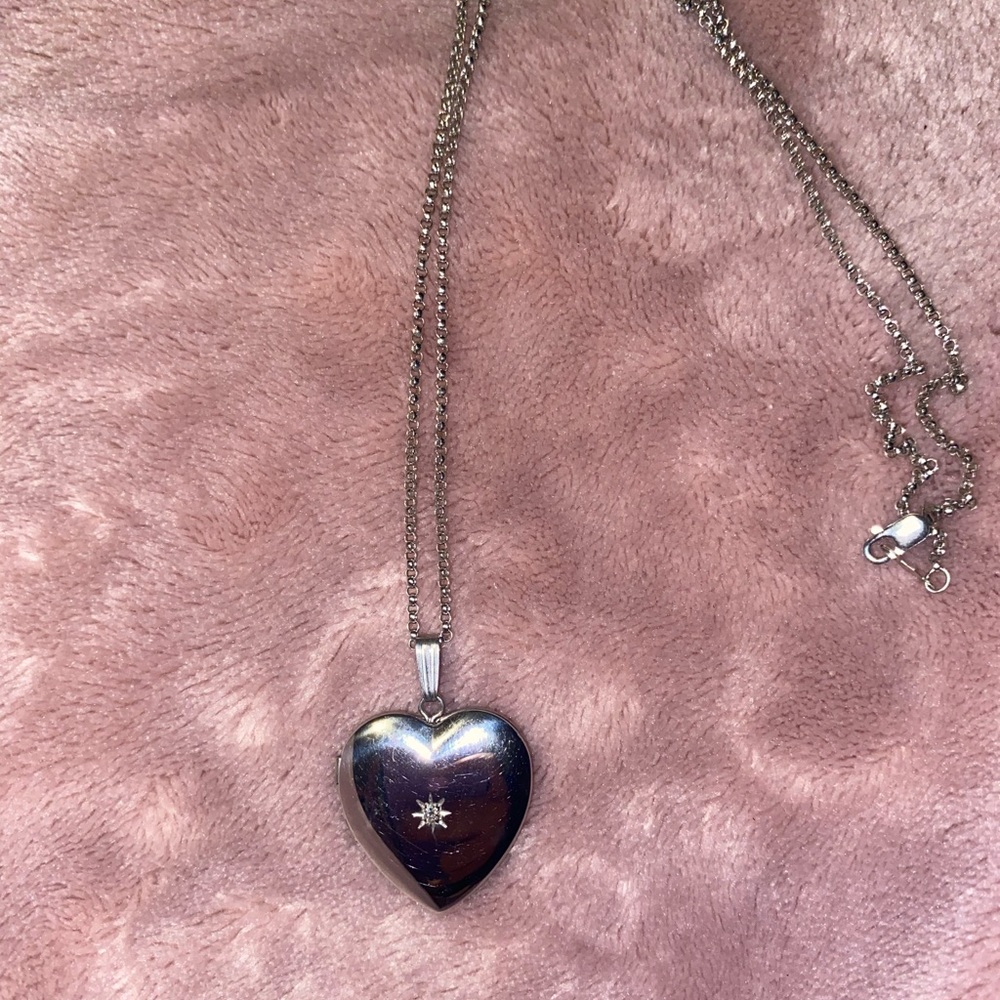 Heart locket with diamond.